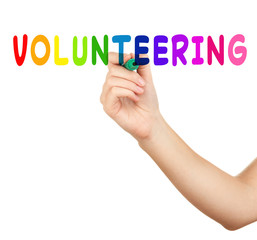 Human hand writing at blank transparent whiteboard