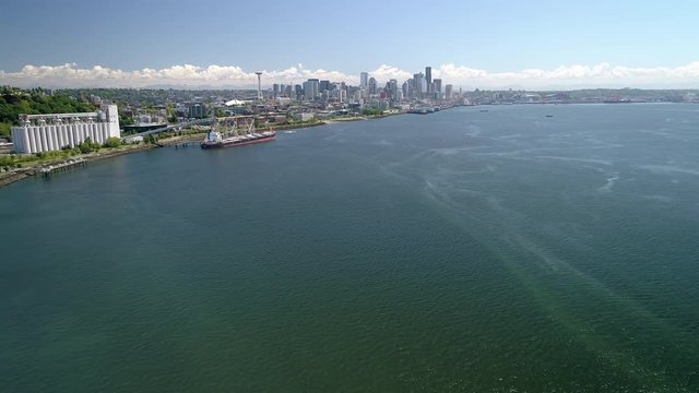 Aerial of Seattle, Washington from Elliot Bay with Waterfront Ocean View of City Skyline