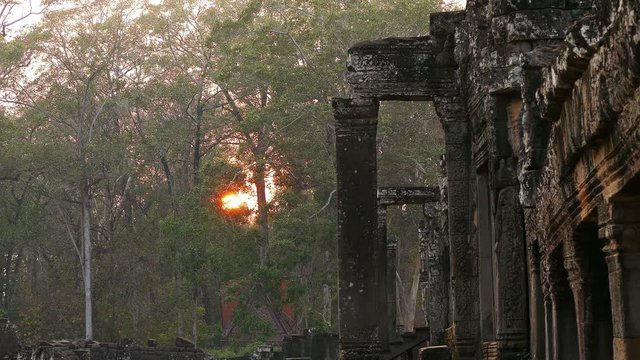 Zoom in of the ancient Bayon temple in Angkor Wat at sunset. Siem Reap, Cambodia.