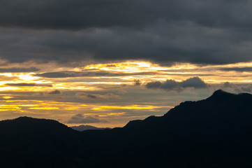 Landscape of sunrise and foggy over the mountain.