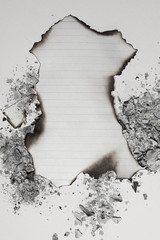 top view of burned empty writing paper sheet