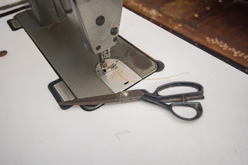 scissors cloth and sewing machine
