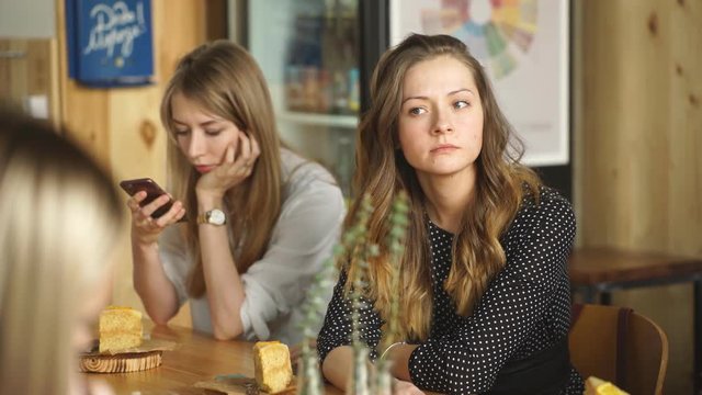a young woman listens carefully