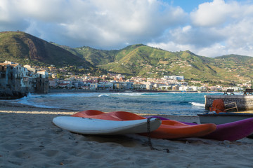 Fototapeta na wymiar Touristic and vacation pearl of Sicily, kayaks in small town of Cefalu, Sicily, south Italy