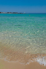 Vacation on the sea, Crystal clear blue sea water texture with glare from the sun