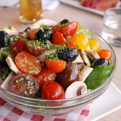 tomato salad with olives and mushrooms
