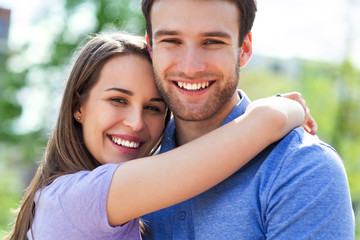 Young couple hugging
