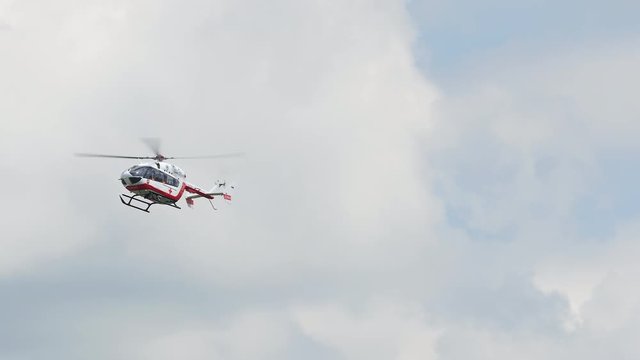 Medical Emergency Helicopter And Clouds