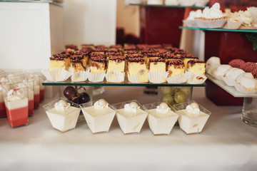 Cheesecake and other desserts served on glass dish