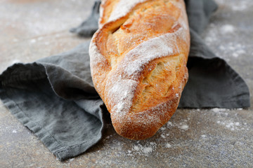 Crunchy French Baguette on slate