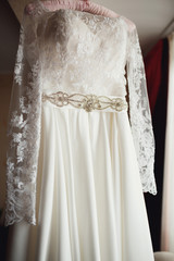 Belt of wedding dress decorated with crystals and pearls