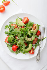 Avocado Salad with tomatoes and arugula