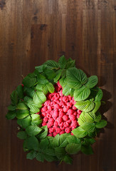 raspberries and green leaves