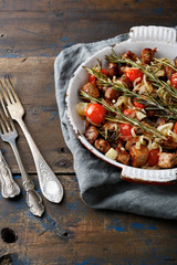 Roasted Pork Meat on frying pan. Rustic background