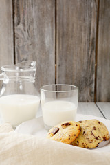 Jug with milk and chocolate cookies