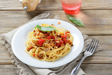 Pasta with tomatoes and mushroom slices