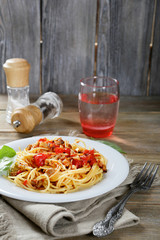 Pasta in a white plate on the boards