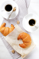 Croissants with coffee for breakfast