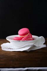 Macaroon in a plate on white napkin