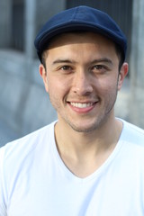 Ethnically ambiguous male smiling close up 