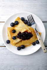 Pancakes with jam and blueberries