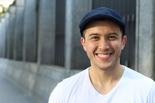 Cute mixed race person male smiling isolated 