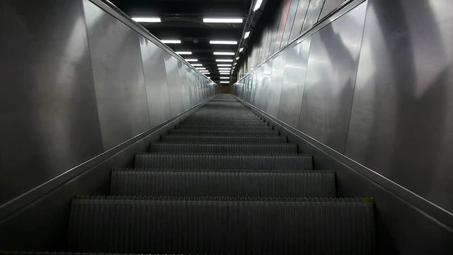 Point of view shot of escalator moving up