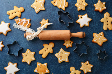 Christmas cookies and wooden rolling pin