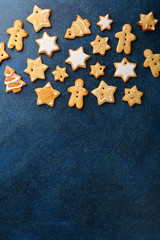 Fototapeta na wymiar Christmas Gingerbread Cookies on a slate background