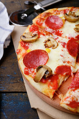 Sliced Pizza with sausage and mushrooms