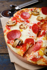 Pizza with sausage and mushrooms