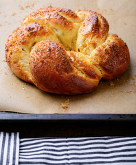 Homemade delicious bun on baking tray