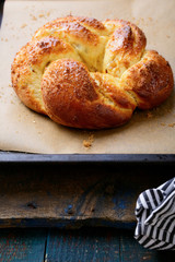 Homemade sweet bun on baking tray