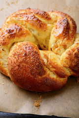 Homemade sweet bun on baking paper