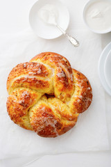 Fresh sweet bun on white paper