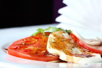 Caprese salad - tomatoes, mozzarella and arugula