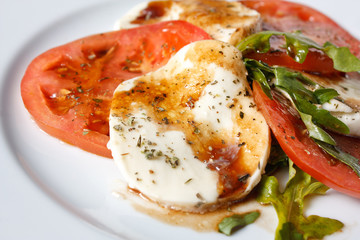 Caprese salad - tomatoes, mozzarella and arugula