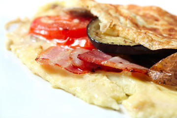 Omelet with vegetables and bacon