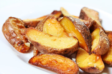 Potato wedges roasted in their skins