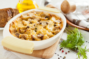 Vegetables casserole with mushrooms, potatoes and cheese