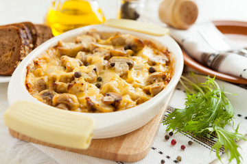 Baked vegetables and cheese on a pan