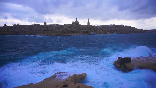 Video of city of Valletta as seen from Silema on a stormy winter morning, Malta