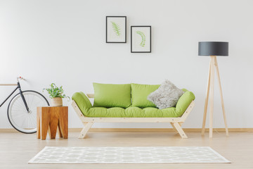Green wooden sofa