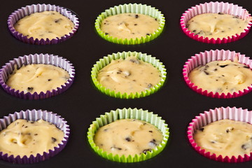 Muffins poured into molds ready to bake