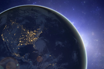 Dark side of the planet Earth with the rising Sun. Elements of this image furnished by NASA