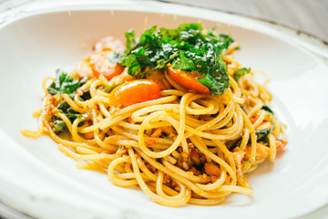 Spicy spaghetti and pasta with salmon