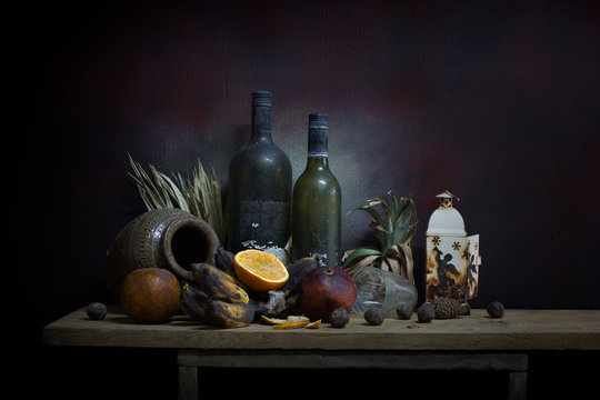 Objects expired and dried and rotten fruits on the plank in dim light night / Still life style  and select focus ..