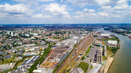 Fototapeta na wymiar Photo aérienne de la ville de Nantes, sous les nuages. Loire Atlantique, France