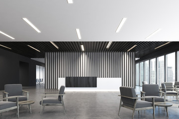 White and black reception, armchairs corner