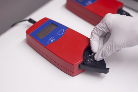 Blood testing equipment being used